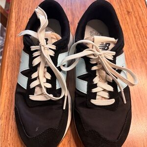 New Balance Black and Light Blue Athletic Shoes